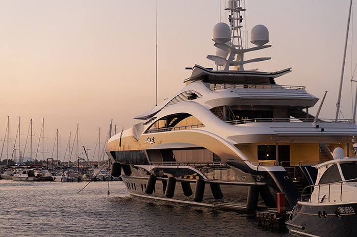 Luxurious yacht docked in harbour