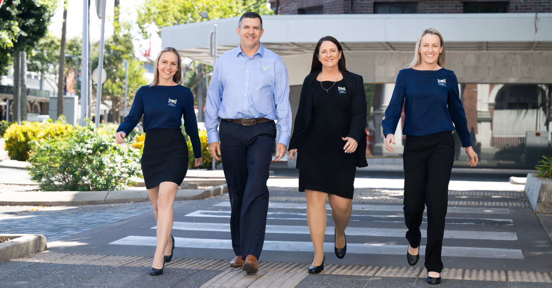 DGL Accountants directors crossing the road