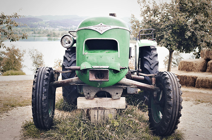 Green tractor on farm