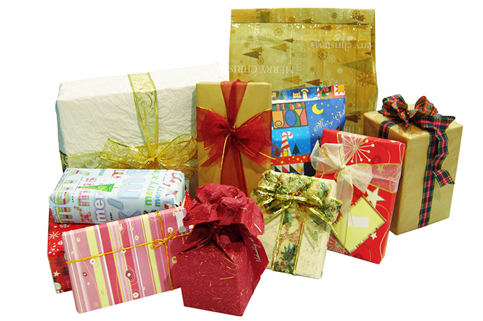 Bundle of presents beautifully wrapped in paper and string