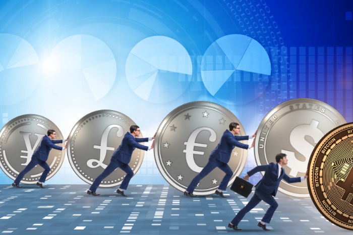Businessmen in a line pushing giant blockchain coins in the form of cryptocurrency with pie charts above and in the background
