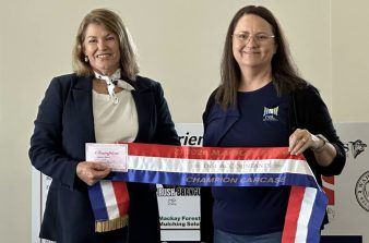 Denise holding a ribbon for the 2026 Mackay Show, Champion Carcase category