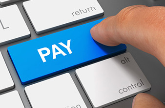 Keyboard with one blue key displaying the word PAY