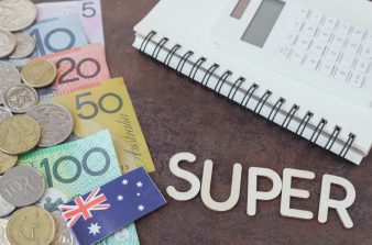 Australian coins + bank notes, a notebook, a calculator and the word "SUPER"