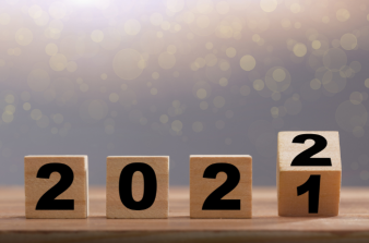 Wooden numbers 2 0 2 1 turning to 2 0 2 2